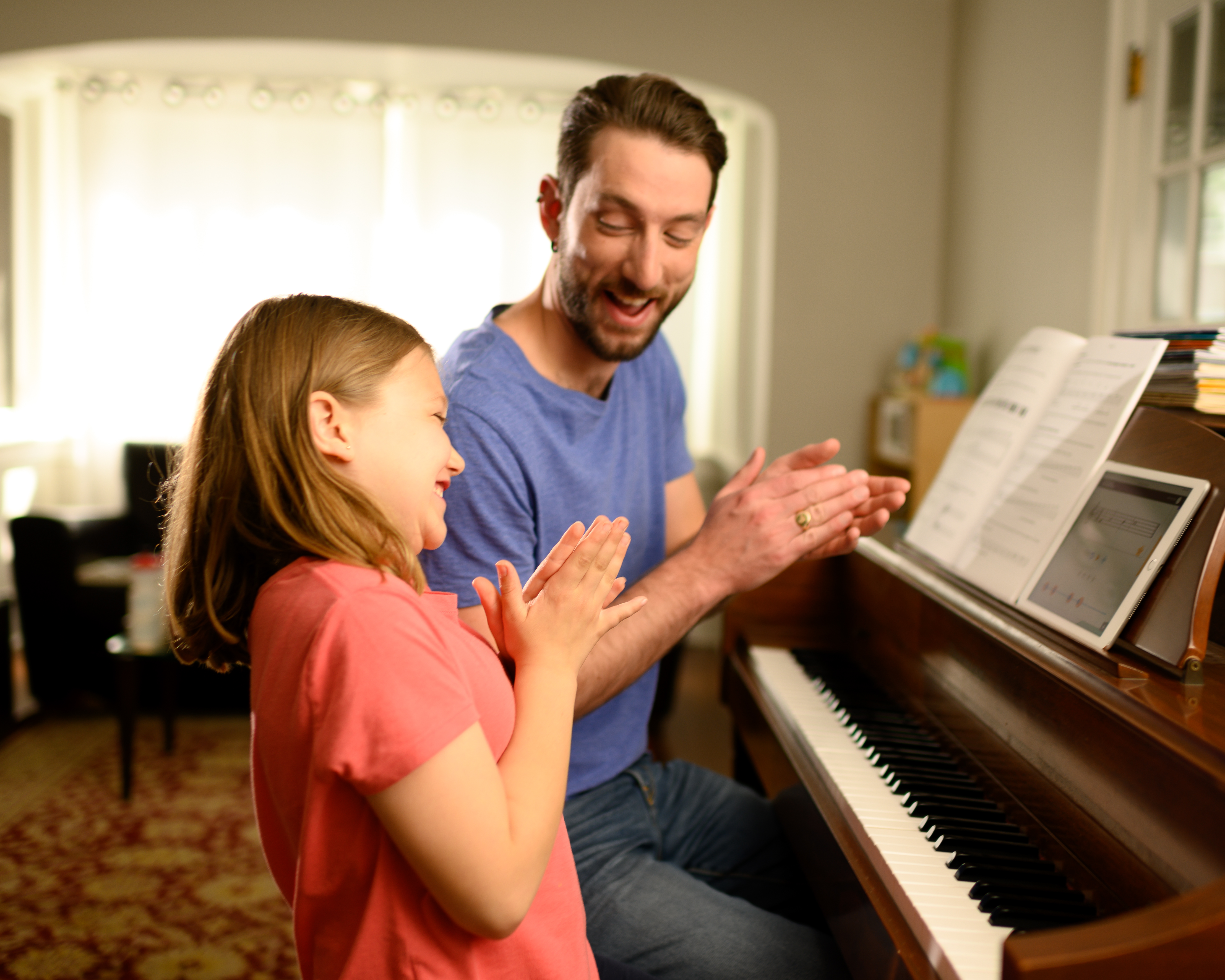 Piano teacher with student
